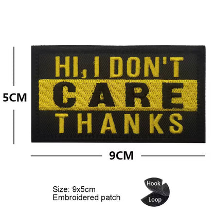 Embroidered patch with 'HI, I DON'T CARE THANKS' text on a black background